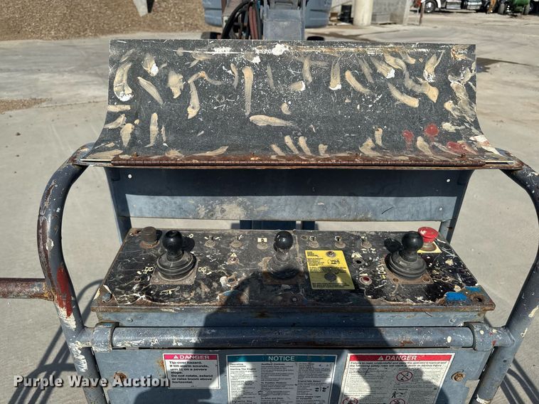 image for item DT0703 2004 Genie S-65 4x4 boom lift