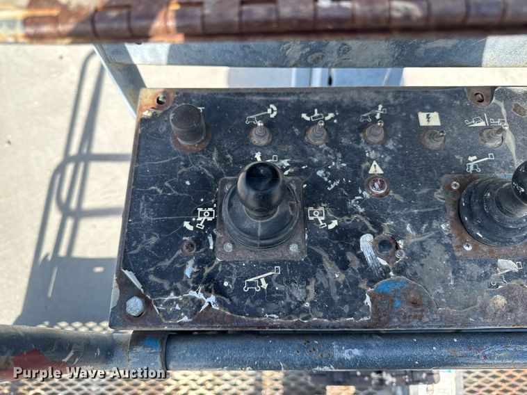 image for item DT0703 2004 Genie S-65 4x4 boom lift