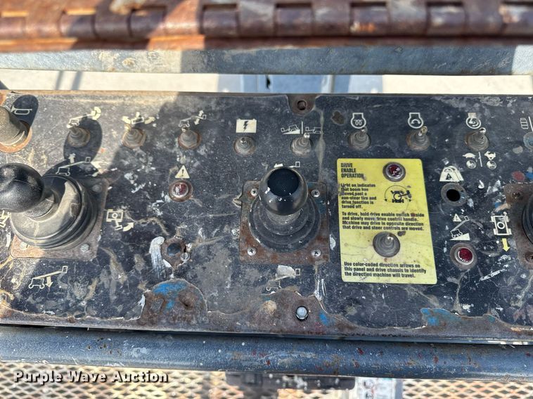 image for item DT0703 2004 Genie S-65 4x4 boom lift