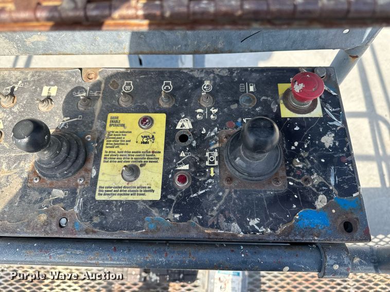 image for item DT0703 2004 Genie S-65 4x4 boom lift