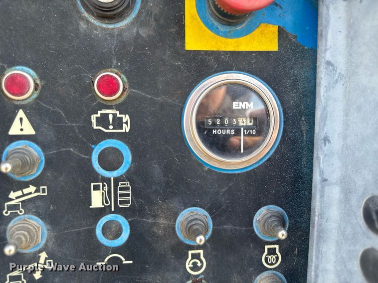 image for item DT0703 2004 Genie S-65 4x4 boom lift