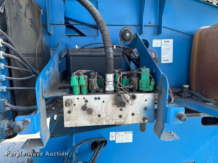 image for item DT0703 2004 Genie S-65 4x4 boom lift