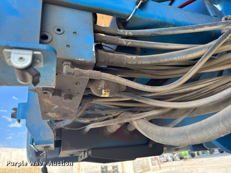 image for item DT0703 2004 Genie S-65 4x4 boom lift