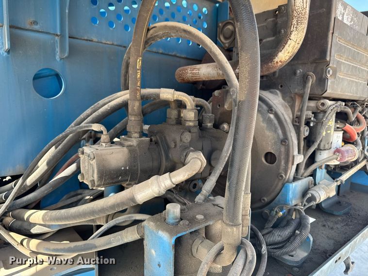 image for item DT0703 2004 Genie S-65 4x4 boom lift