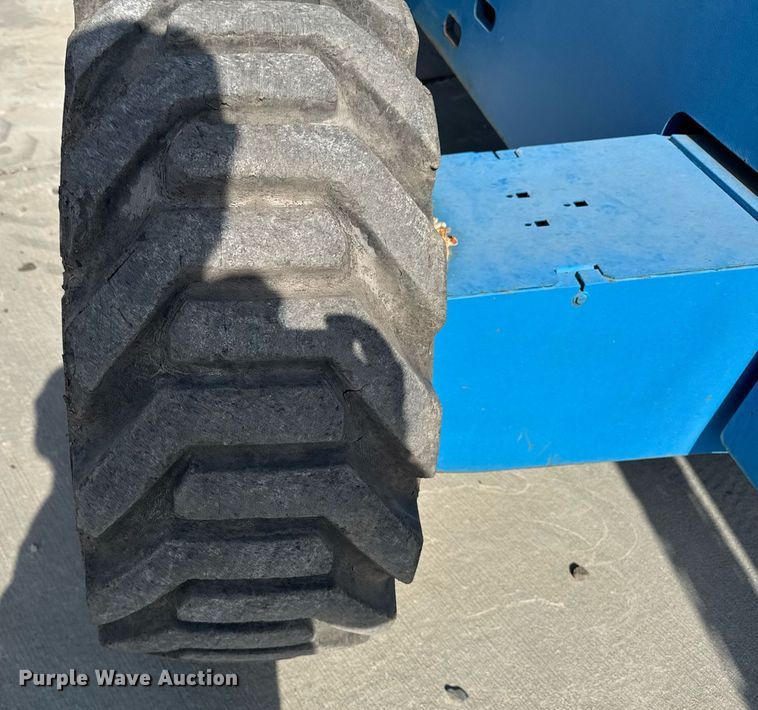 image for item DT0703 2004 Genie S-65 4x4 boom lift