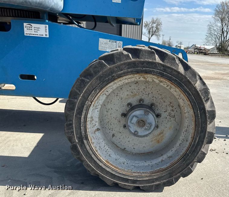 image for item DT0703 2004 Genie S-65 4x4 boom lift