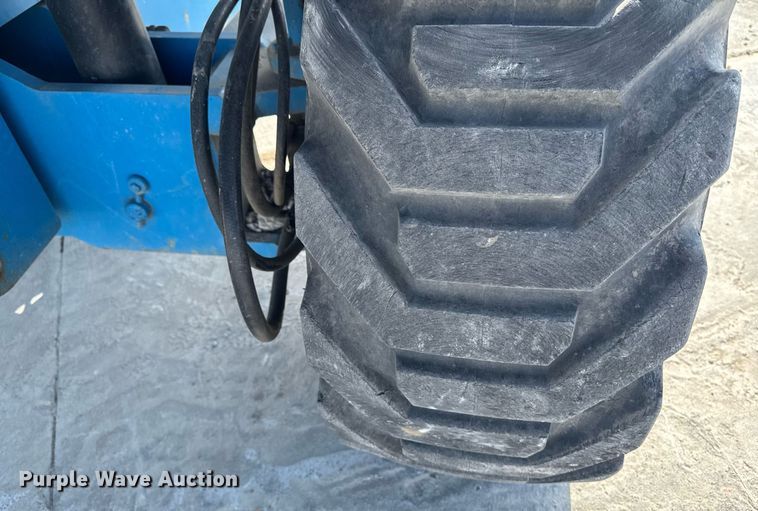 image for item DT0703 2004 Genie S-65 4x4 boom lift