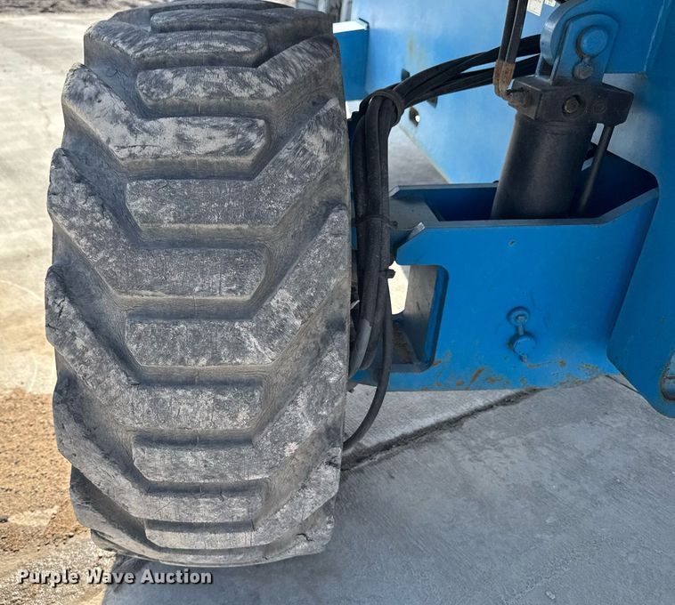 image for item DT0703 2004 Genie S-65 4x4 boom lift