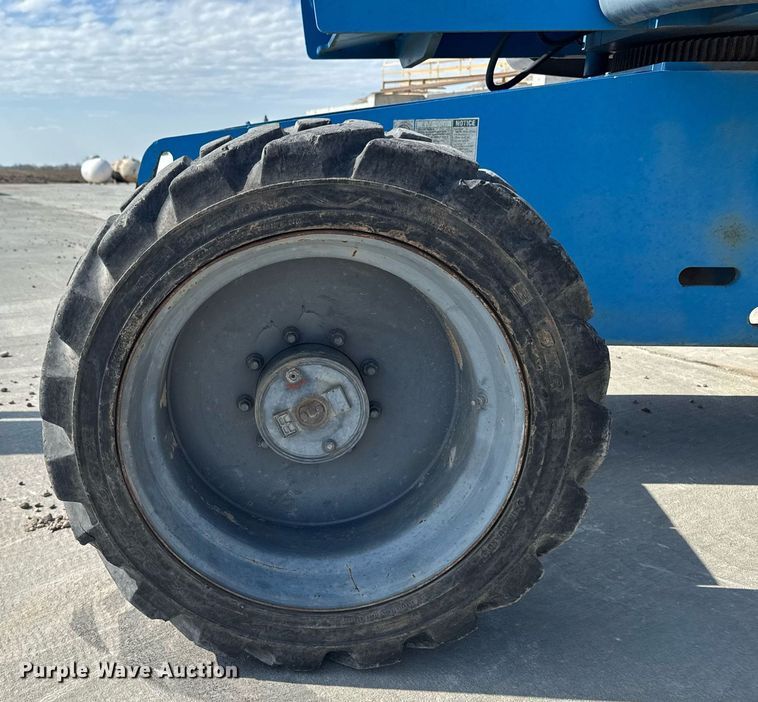 image for item DT0703 2004 Genie S-65 4x4 boom lift