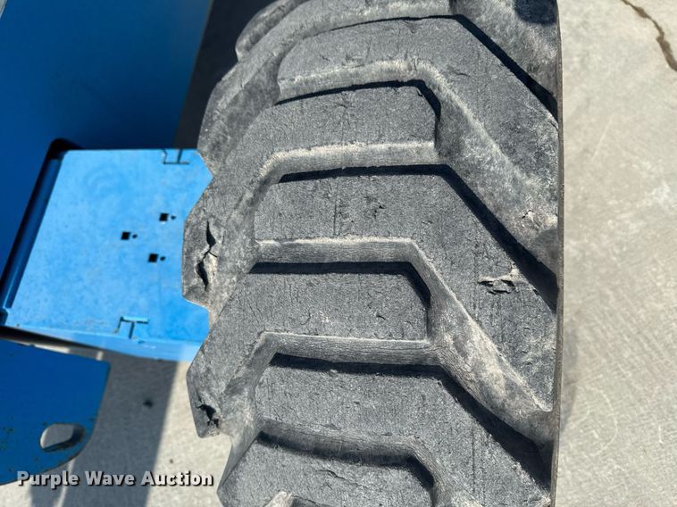 image for item DT0703 2004 Genie S-65 4x4 boom lift