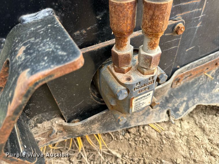 image for item DV1990 2014 Caterpillar BU118 skid steer broom