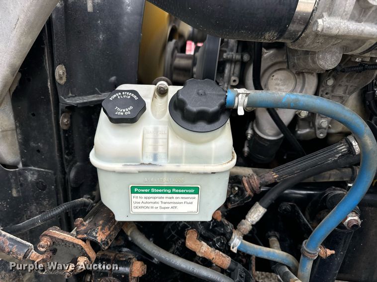 image for item DV1996 2015 Western Star 4700SF roll-off container truck