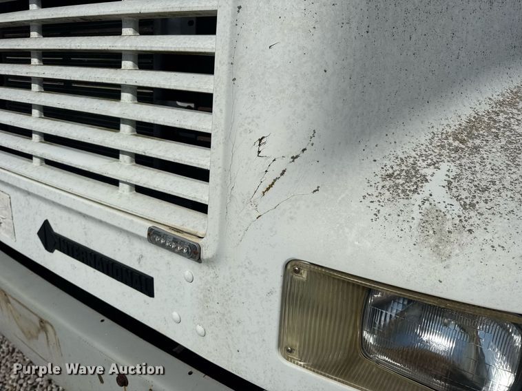 image for item DV4017 1999 International 4900 flatbed truck