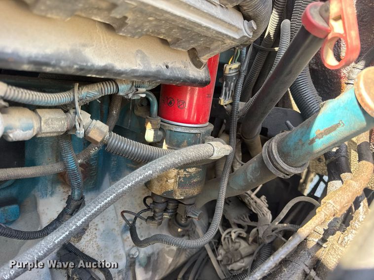 image for item DV4017 1999 International 4900 flatbed truck