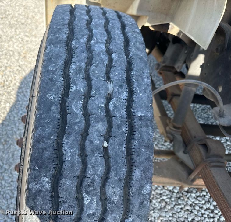 image for item DV4017 1999 International 4900 flatbed truck