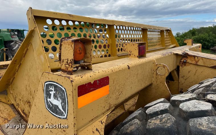 image for item DV4025 2008 John Deere 2112E scraper