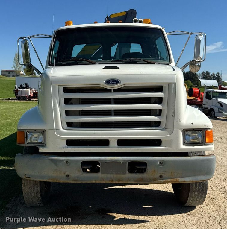 image for item EF1987 1998 Ford L8501 flatbed truck