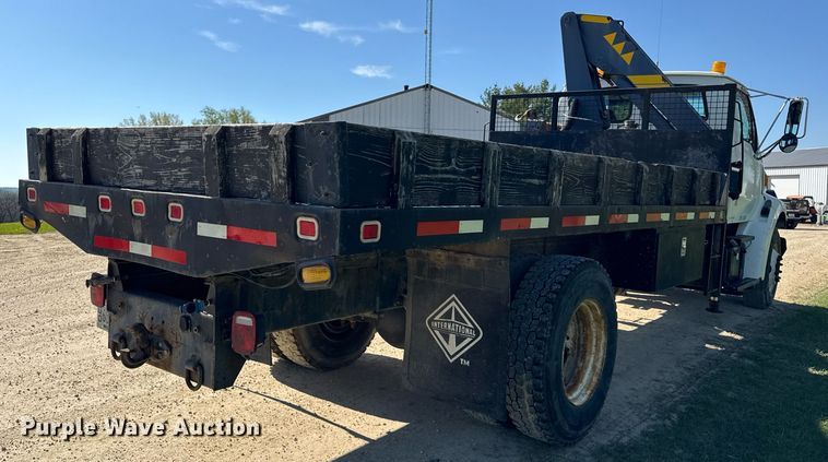 image for item EF1987 1998 Ford L8501 flatbed truck
