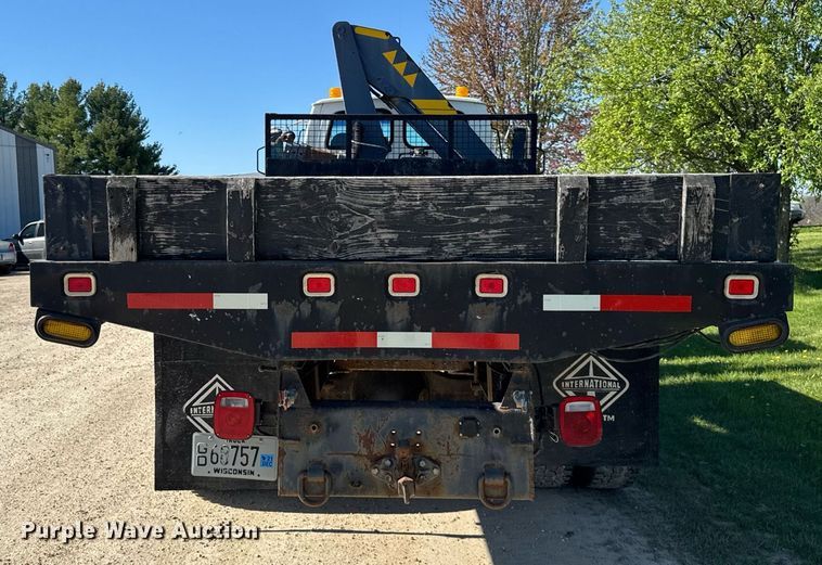 image for item EF1987 1998 Ford L8501 flatbed truck