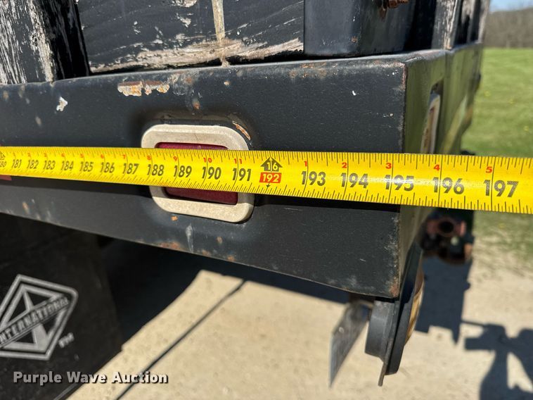 image for item EF1987 1998 Ford L8501 flatbed truck