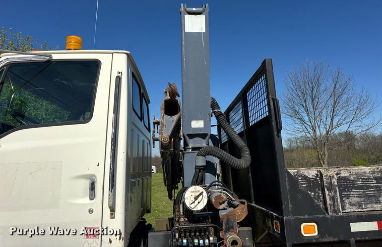 image for item EF1987 1998 Ford L8501 flatbed truck