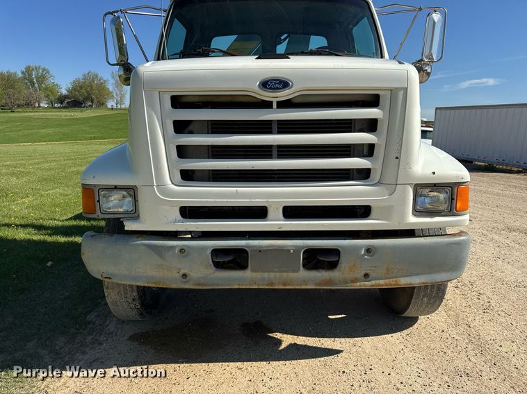 image for item EF1987 1998 Ford L8501 flatbed truck