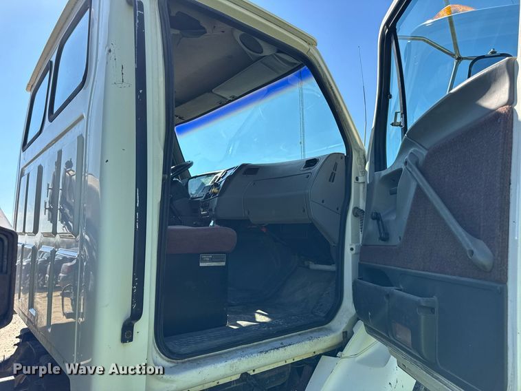 image for item EF1987 1998 Ford L8501 flatbed truck