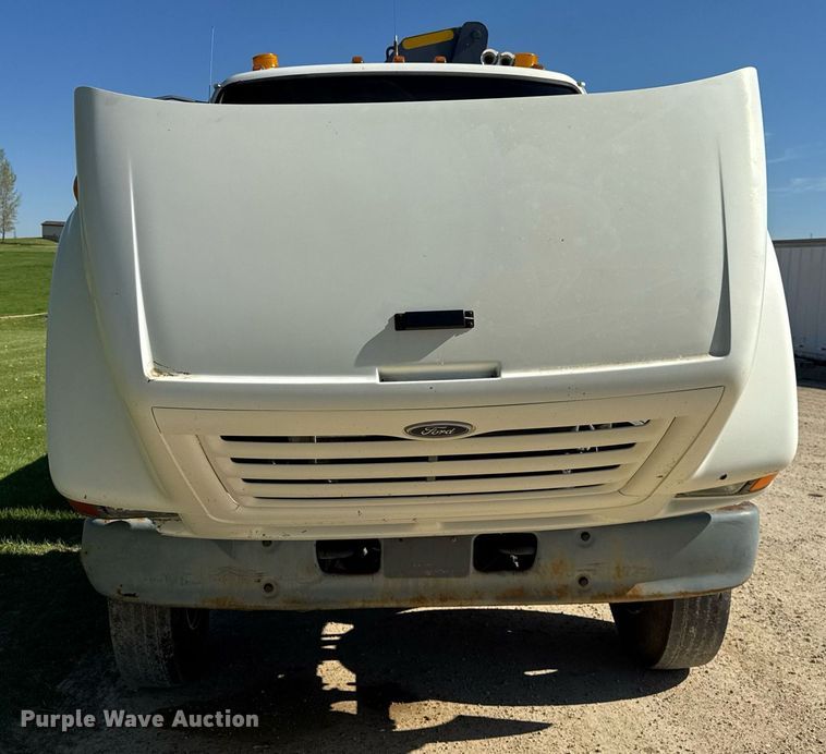 image for item EF1987 1998 Ford L8501 flatbed truck