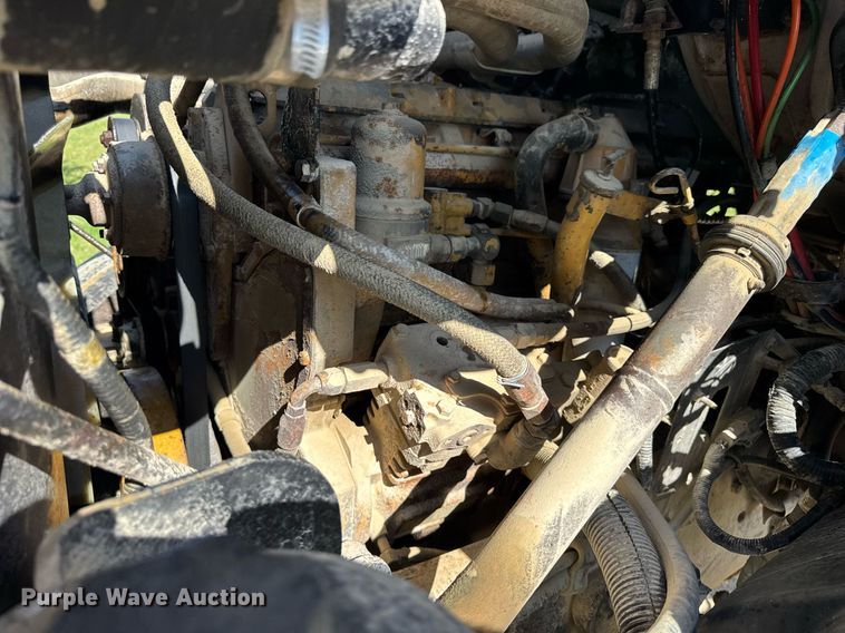 image for item EF1987 1998 Ford L8501 flatbed truck