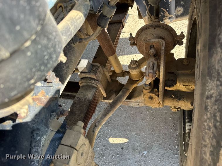 image for item EF1987 1998 Ford L8501 flatbed truck