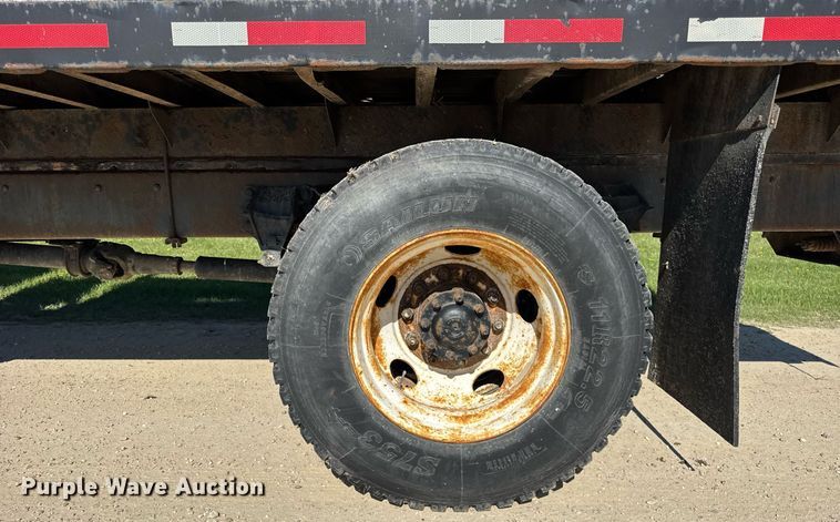 image for item EF1987 1998 Ford L8501 flatbed truck