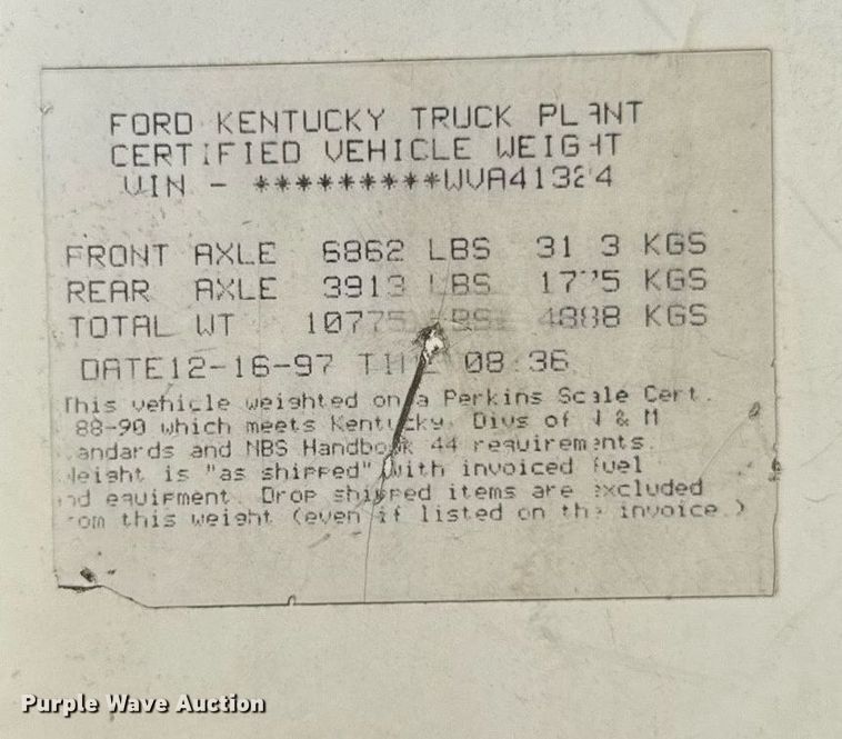 image for item EF1987 1998 Ford L8501 flatbed truck