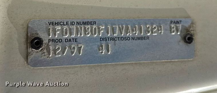 image for item EF1987 1998 Ford L8501 flatbed truck