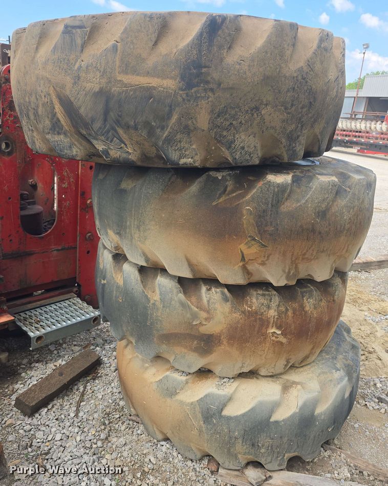 image for item EK5222 (4) Firestone 15.5-25 foam filled tires and wheels