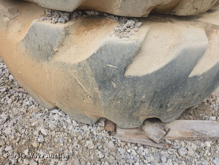 image for item EK5222 (4) Firestone 15.5-25 foam filled tires and wheels