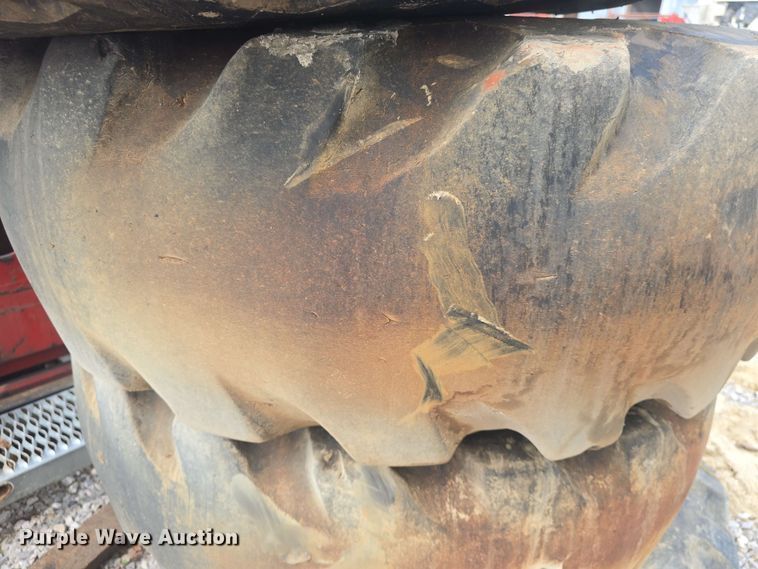 image for item EK5222 (4) Firestone 15.5-25 foam filled tires and wheels