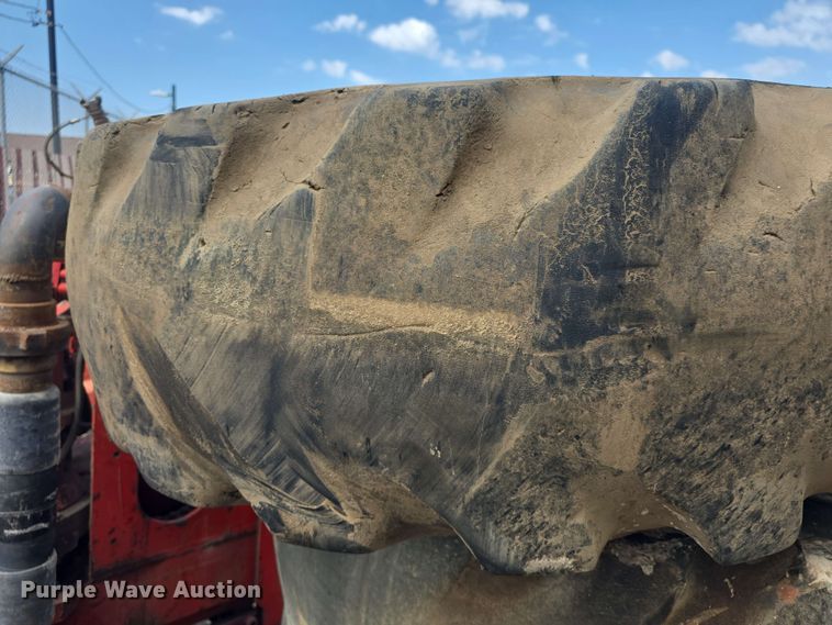 image for item EK5222 (4) Firestone 15.5-25 foam filled tires and wheels