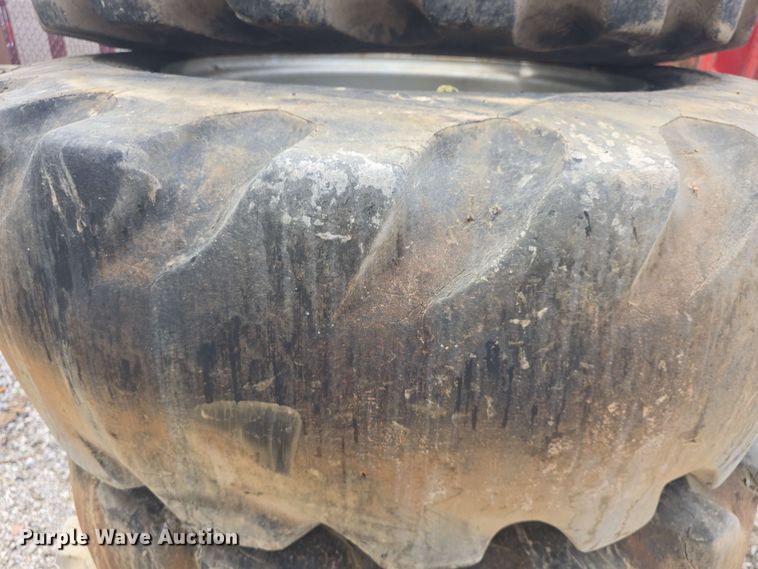 image for item EK5222 (4) Firestone 15.5-25 foam filled tires and wheels