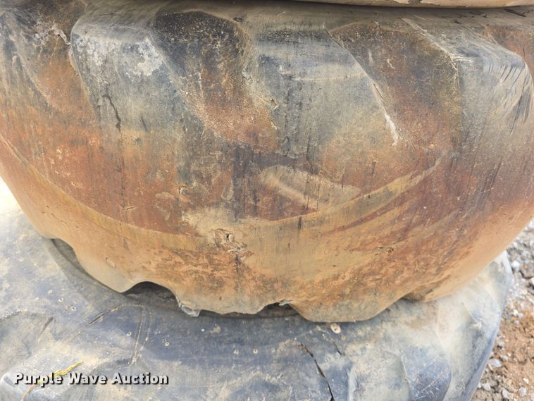 image for item EK5222 (4) Firestone 15.5-25 foam filled tires and wheels