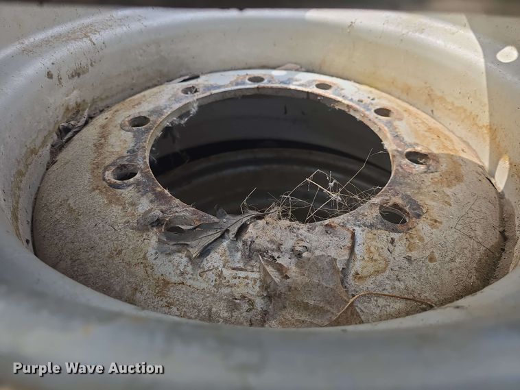 image for item EK5222 (4) Firestone 15.5-25 foam filled tires and wheels