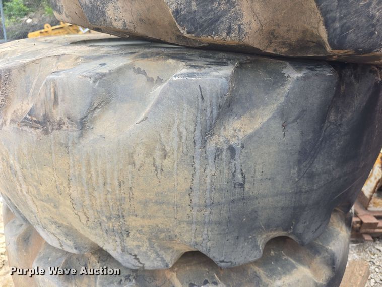 image for item EK5222 (4) Firestone 15.5-25 foam filled tires and wheels