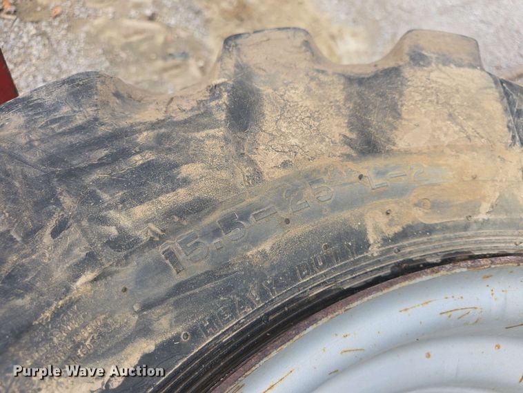 image for item EK5222 (4) Firestone 15.5-25 foam filled tires and wheels