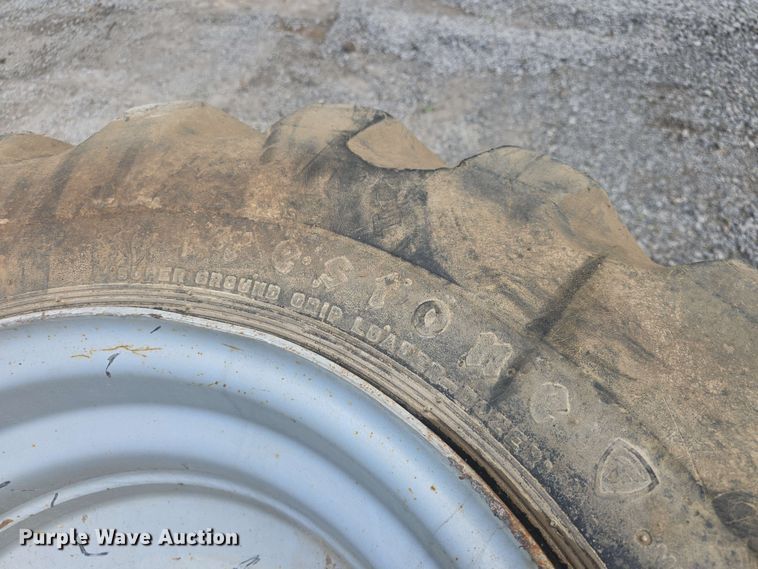 image for item EK5222 (4) Firestone 15.5-25 foam filled tires and wheels