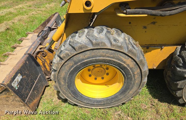 image for item EM7330 2003 John Deere 270 Series II skid steer loader