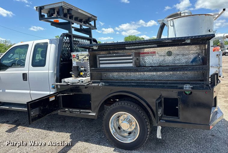 image for item EQ1463 2015 Ford F450 Super Duty SuperCab flatbed truck