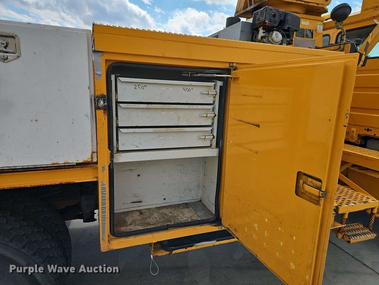 image for item EJ0023 2001 Freightliner FL70 digger derrick truck