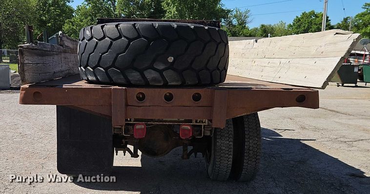 image for item EJ0035 1995 Ford F700 dump flatbed truck