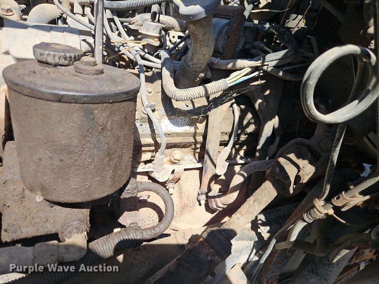 image for item EJ0035 1995 Ford F700 dump flatbed truck