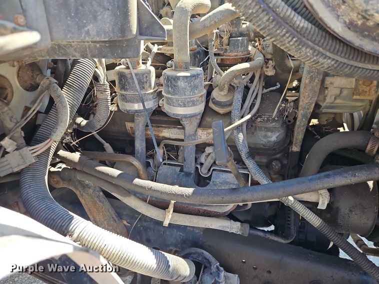 image for item EJ0035 1995 Ford F700 dump flatbed truck