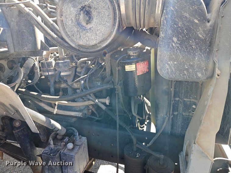 image for item EJ0035 1995 Ford F700 dump flatbed truck